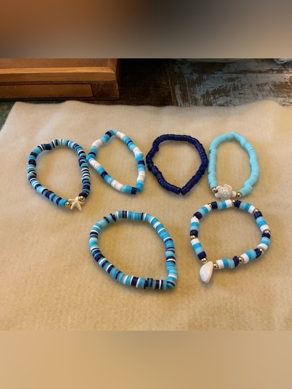 Set of 7 Blue Beaded Stretch Bracelets with Shell Charms